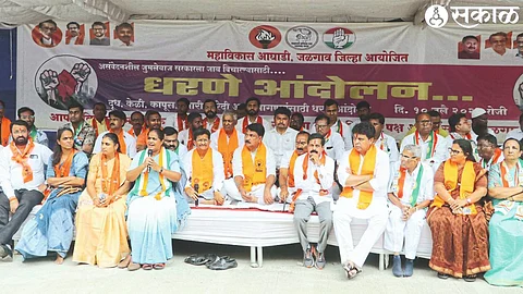 Officials of Mahavikas Aghadi protesting in front of the Collectorate on Wednesday.