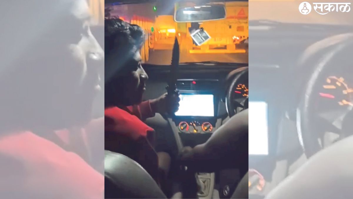 A suspect sitting in a four-wheeler with a chopper in his hand.