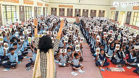 Instructor teaching mandala art to children in schools in Surgana