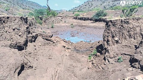 The dam built by the forest department and the first to burst in rain.