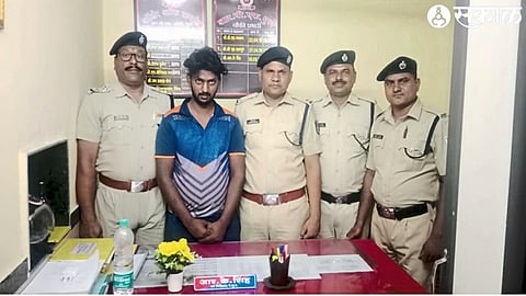 RPF officers, personnel along with the suspect carrying hemp-like material from the train.