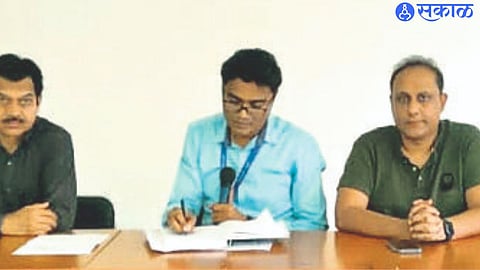 Nima office bearers questioning power distribution officials at Nima House.