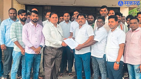 Villagers giving a statement to Naib Tehsildar Dilip Kulkarni.