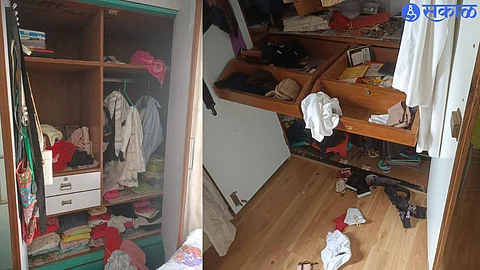 Suspected thief caught on CCTV camera. In the second photo, Dr. Thieves misplaced belongings in Mamta Patil's flat.