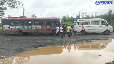 Bus and ambulance parked at Jamunmatha fork for delivery.