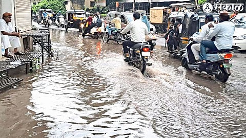 Water accumulated in front of the old municipal building on Tuesday