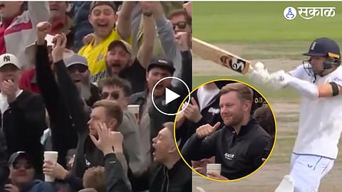 Fan's Catch with a Drink in Hand and Ball in Other