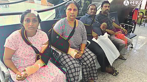 Injured in bus accident waiting for flight at airport to come to Mumbai.