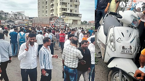 The crowd at the accident site on the highway, the accident scooty.