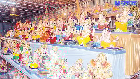 A woman craftsman putting the finishing touches on an idol. In the second picture, the idols sold in the market.