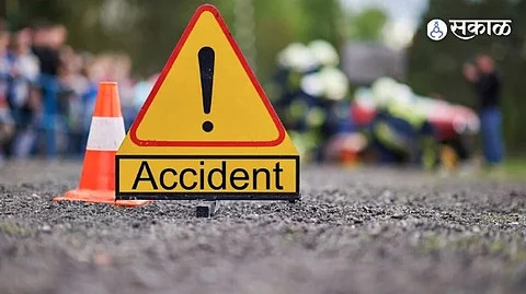 Accident scene near Theur Phata in Pune where a dumper collided with a car, leading to the death of a father and son.
