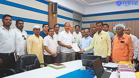 MLA Kunal Patil giving a statement regarding water distribution.