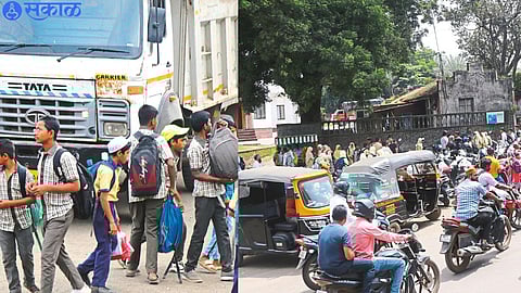 Vehicles parked on the road after school outside Urd National School.
