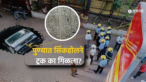 A municipal truck submerged in a 25-foot deep sinkhole near Pune’s City Post Office at Budhwar Peth.