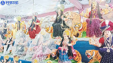 Idols sold in Dwarka on the occasion of Navratri. In the second photograph, the idol of goddess inlaid with cashew nuts.