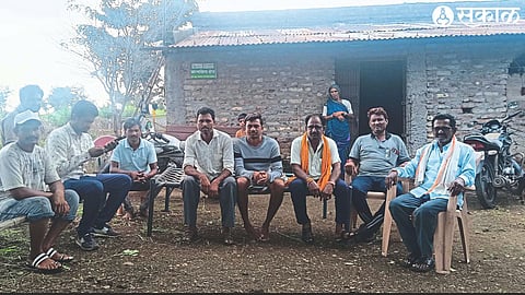 Villagers sitting outside their homes due to explosion-like sounds.