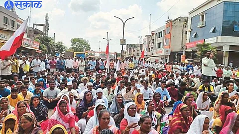 Adivasi members of the community during the Road Roko protest in the taluka on Monday.