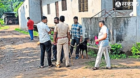 Police officers with dog squad inspecting the scene of the murder.