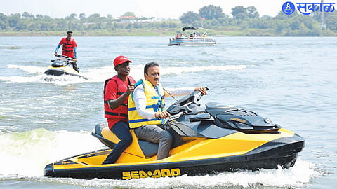 Tourism Minister Girish Mahajan himself enjoying speed boating during the three-day water tourism festival at Mehrun Lake.