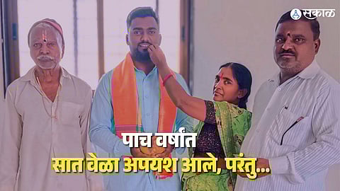 Vitthal Kolekar's mother and father feeding him Sweet