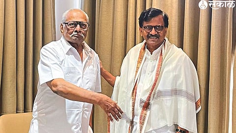 Anil Gote felicitating MP Sanjay Raut during his city tour on Saturday.