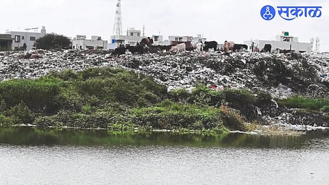 Dumping ground on the banks of Sivandi at Lasalgaon.