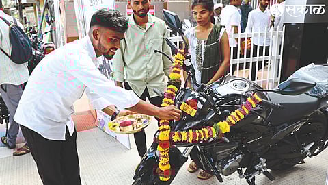 Citizens performing pooja after purchasing a vehicle on the occasion of Vijayadashami