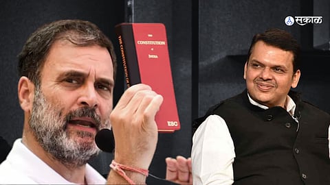 Rahul Gandhi holding a red constitution