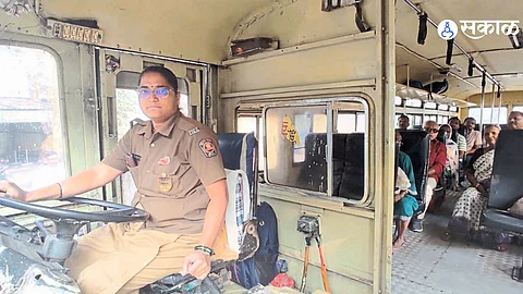 Saroj Hande, the pioneering woman driver, taking control of the ST bus on the Malkapur-Kolhapur route, breaking barriers in the transport industry.