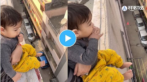Shocking moment as mother puts child at risk for viral video
