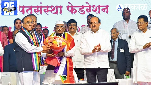 Haribhau Bagde addresses the Shirdi cooperative conference, stressing the importance of strengthening the cooperative movement."
