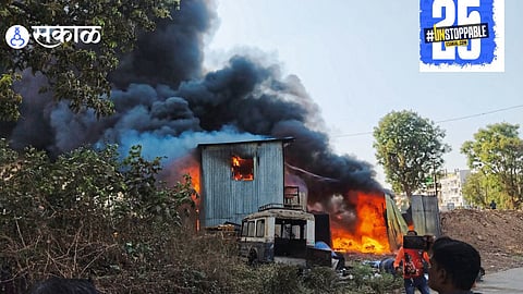 "Firefighters battling the massive blaze at a scrap warehouse in Shirwal, which led to the destruction of lakhs worth of materials."
