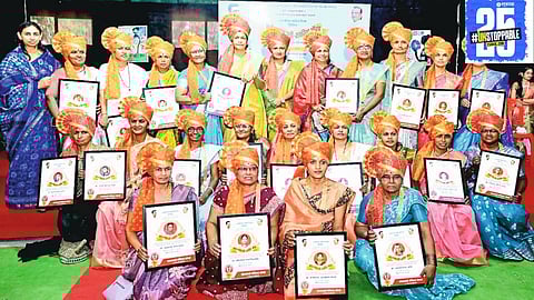 Sunita Gadakh distributing the Women’s Strength Awards, recognizing the essential role of women in sustaining family life and promoting empowerment.
