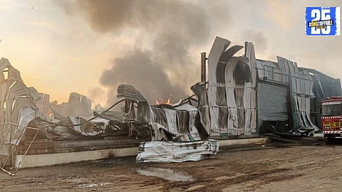 Firefighters work to control the massive fire that destroyed a banana packaging unit at Tempurni MIDC, causing an estimated loss of Rs. 12-15 crores.