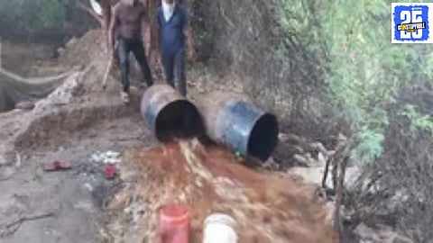 Police raid an illegal handcrafted liquor den, taking the woman operator into custody for her involvement in the illegal alcohol trade.