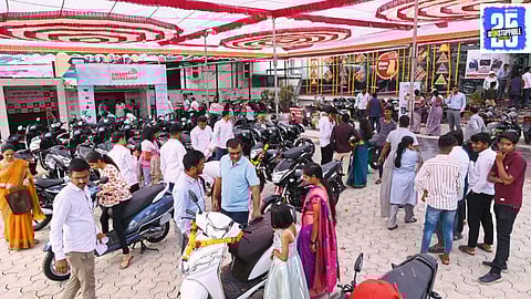 Crowds gather for gold and vehicle purchases on Gudi Padwa, as festive shopping reaches new heights during the auspicious occasion.