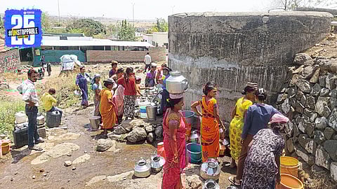 Women waiting in long queues under the sun for drinking water in a drought-affected village