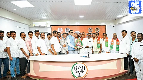 Atul Bhosale welcomes the Chande uncle-nephew duo from Malakapur into BJP during an event in Mumbai, signaling a shift in local political dynamics.