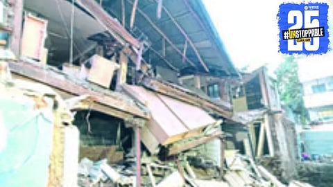Scene of the collapsed building in Satara where the wall fell suddenly, leaving locals in shock.