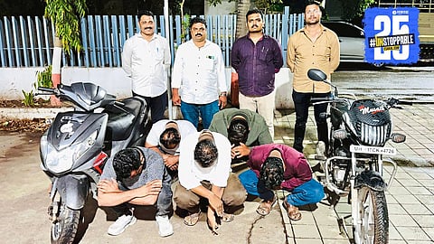 Seized items including sand, liquor, and gambling materials worth ₹13 lakh after a massive police raid.