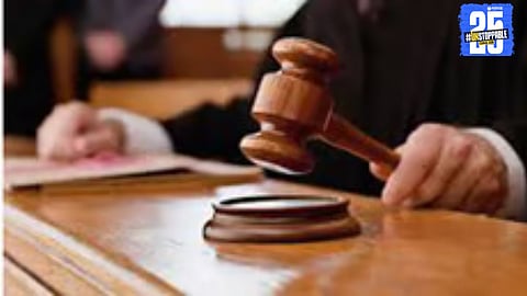 The accused being taken into custody after the Vaduj court pronounced life imprisonment in the mother-in-law murder case.