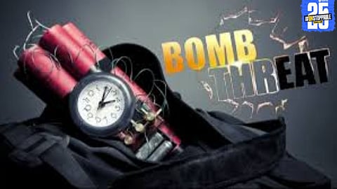 Police personnel stationed outside the District Collector Office following a bomb threat received via email.