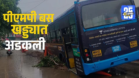 PMP bus stuck in a pothole at Warje Malwadi due to Pune Municipal Corporation’s negligent road work