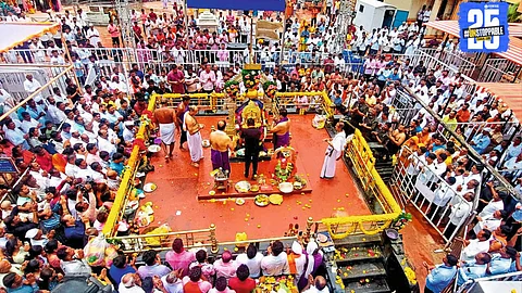 Shani idol adorned with a divine mask and ornaments as two lakh devotees gather for Shani Jayanti darshan.