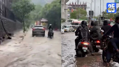"Vehicles submerged and employees wading through knee-deep water at Pune's Hinjewadi IT Park after torrential rain turned roads into rivers."