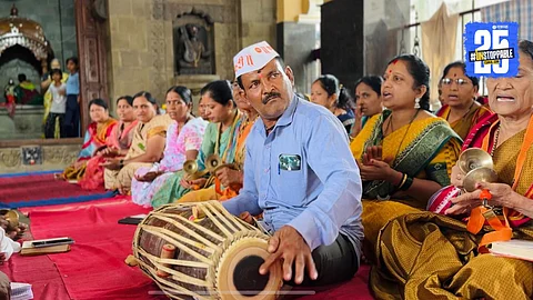 Yasin Attar, a Muslim Warkari, plays the pakhawaj during Ashadhi Wari 2025, embodying communal harmony and spiritual devotion from Dehu to Pandharpur