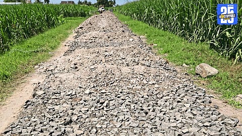Angry villagers of Tanpure Vasti halt road work in Bhalgaon, demanding transparency and quality assurance.