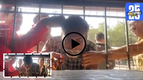 A drunk man's head gets stuck in a liquor shop's window grill while trying to enter for alcohol — a shocking yet viral moment from Maharashtra.