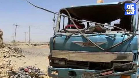 Security personnel inspect the bullet-riddled bus after armed attackers opened fire on passengers in Pakistan's Balochistan region, killing 9 civilians after verifying their identities.