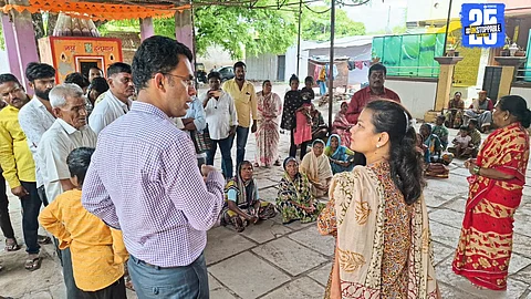 MP Praniti Shinde interacting with residents of the leprosy colony in Solapur; assures housing support under government scheme.